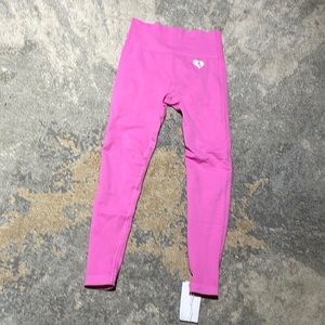 Women’s Best pink athletic leggings, never worn, brand new with tags